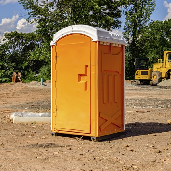 what is the cost difference between standard and deluxe porta potty rentals in Bloomdale